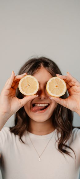 girl with oranges Wallpaper 1440x3200