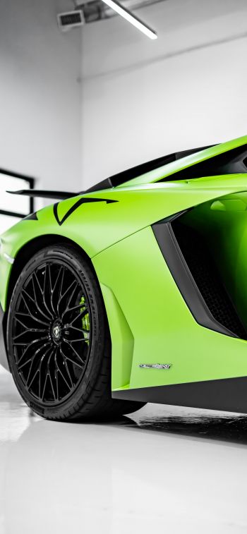 green sports car Wallpaper 1284x2778
