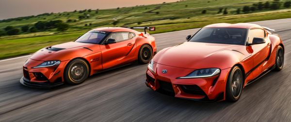 Toyota GR Supra, red car, speed Wallpaper 2560x1080